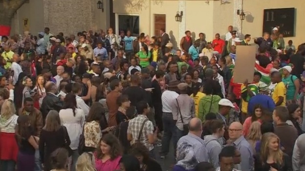 Crowds gathered outside Nelson Mandela's home to pay their respects and celebrate his life.
