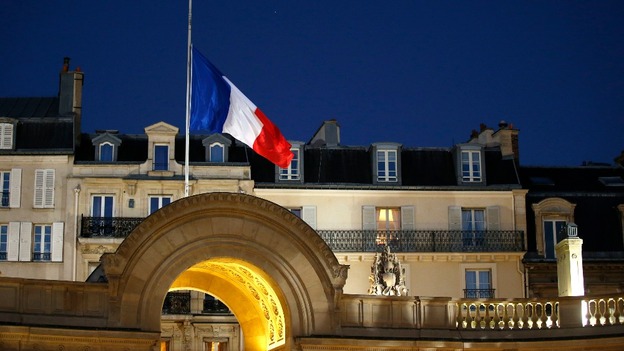 The French flag flies at at half mast in the courtyard of the Elysee Palace in Paris.