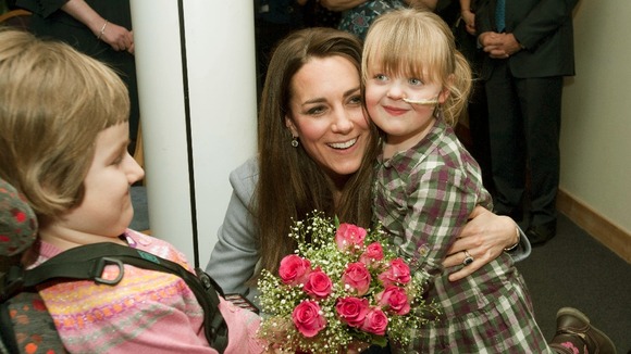 The Duchess Of Cambridge meeting Demi-Leigh Armstrong, 5 (right) while visiting the hospice.