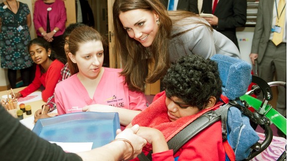Kate chats to the nurses and children at the hospice.