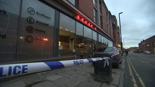 Akbar's restaurant with a police cordon in place