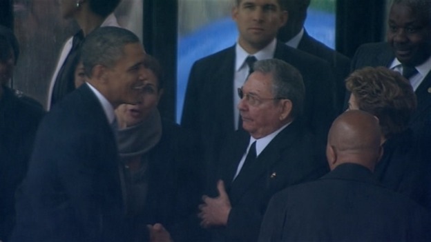 President Obama shakes hands with Raul Castro