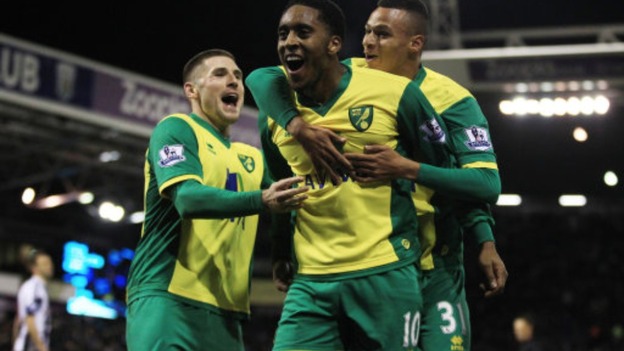 Josh Murphy, seen here embracing Leroy Fer after Saturday's win over West Brom, has now broken into the Canaries first team.