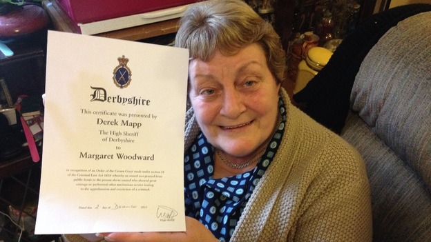 Margaret Woodward with her certificate