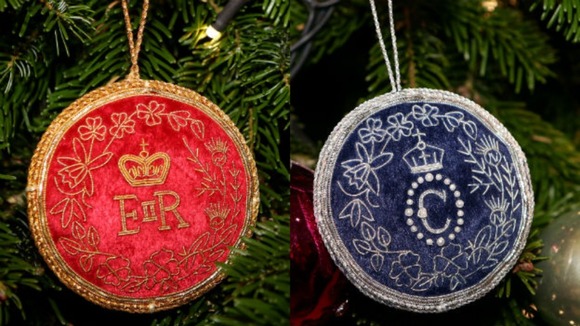 The specially-made royal trinkets hung on the tree by the Queen and Camilla.