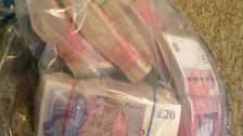 £80,000 seized by police