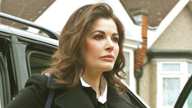 Nigella Lawson climbing out of a car near Isleworth Crown Court.