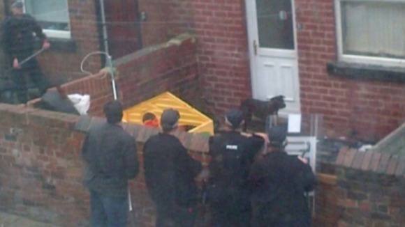 One of the dogs was captured by police at the back of the property, the other was caught inside.