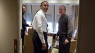 President Barack Obama jokes with former President George W. Bush shortly after boarding Air Force One for the trip to South Africa.