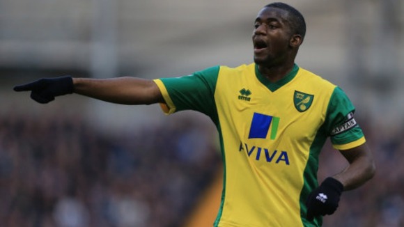 Sebastien Bassong has committed his future to Norwich City.