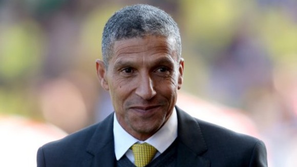 Chris Hughton is happy to have secured Sebastien Bassong's future.