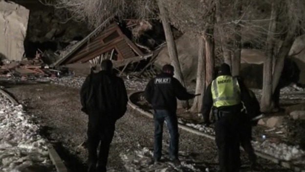 Police search the property in Rockville, Utah for survivors