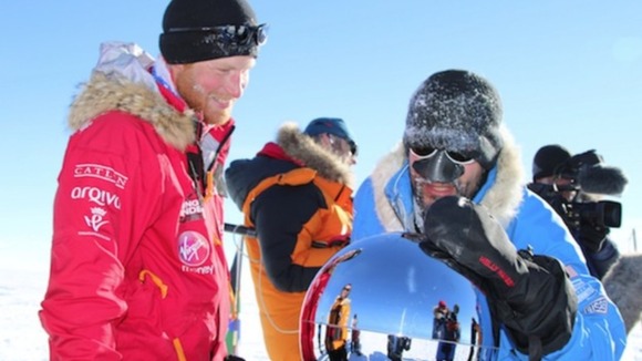 The prince reached the bottom of the world at midday after more than three weeks of arduous trekking.