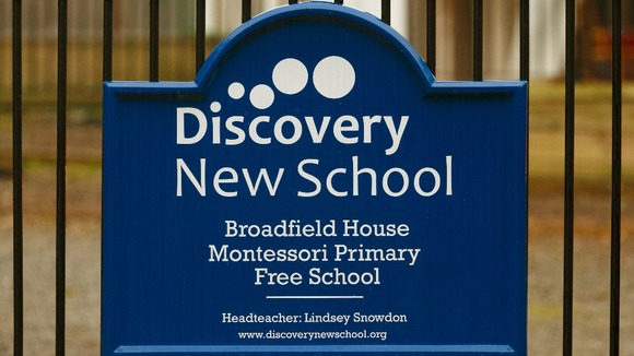 The sign at the front of the school