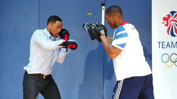 Will Smith (left) doing pad work with Anthony Joshua, GB Super Heavyweight boxer.