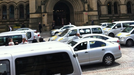 Private hire taxis surrounding Manchester Town Hall