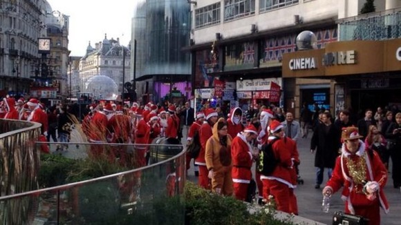 Santa revellers gathering in London's Leicester Square