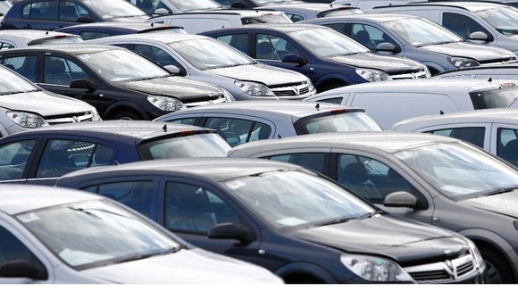 New cars are seen standing outside the Ellesmere Port plant, near Liverpool