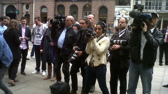 Cameramen and photographers wait for Sam Hallam 