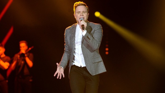 Olly Murs performing on stage during the 2013 Capital FM Jingle Bell Ball at the O2 Arena.