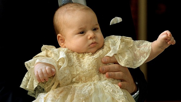 Prince George of Cambridge pictured wearing the hand-made gown in October.