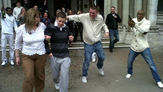 Sam Hallam leaving the Court of Appeal with his mother Wendy today.