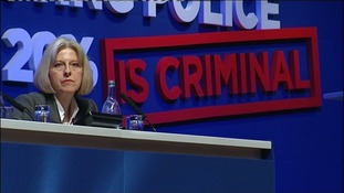 Home Secretary Theresa May on the podium of the Police Federation Conference