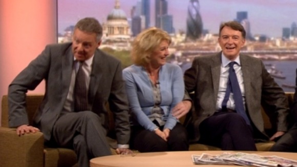 Rory Bremner (L) and Peter Mandelson react after defence minister Anna Soubry's comment