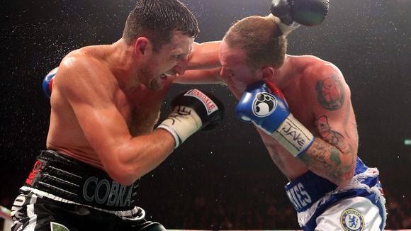 Carl Froch (left) and George Groves during the WBA and IBF Super Middleweight Title fight