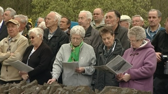 People at memorial service