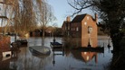 Cropthorne Mill is surrounded by floodwater from the River Avon in Fladbury, Worcestershire, after heavy rain