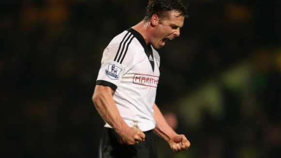 Fulham's Scott Parker celebrates victory at Carrow Road.