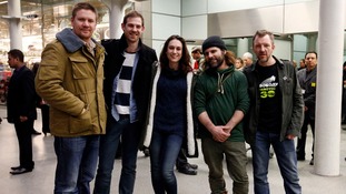 Five of the six Britons held in Russian jail pose for pictures upon their return to London