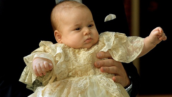 Prince George of Cambridge pictured wearing the hand-made gown in October.