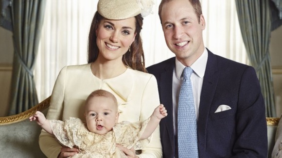The Duke and Duchess of Cambridge with their son Prince George at his christening.