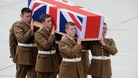 Soldiers carrying coffin