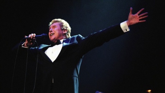 Michael Crawford has been awarded a CBE for services to children's charities.