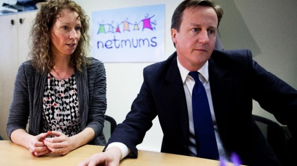 Sally Russell photographed with Prime Minister David Cameron in 2012.