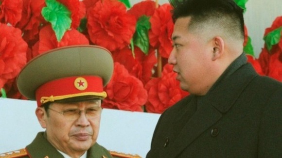 Kim Jong-un pictured with his uncle Jang Song-thaek in 2012.