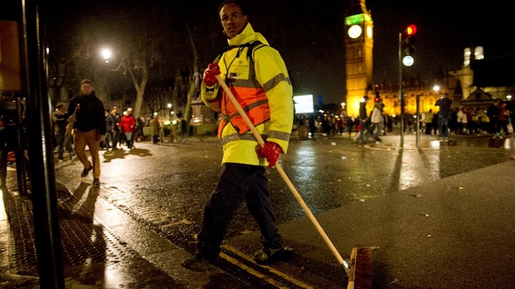 The clean up begins in central London after the New Year celebrations.