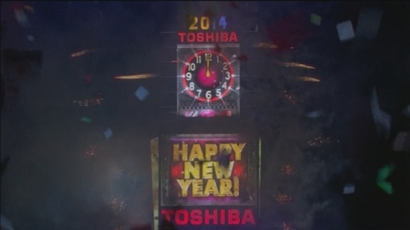 New York rings in the New Year to the strains of Auld Lang Syne.