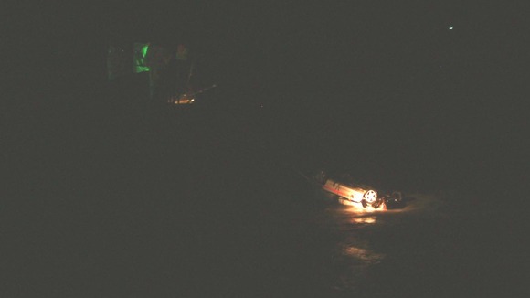 Car overturned in sea
