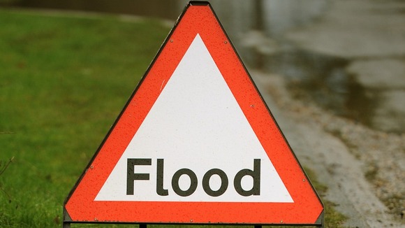 A flood sign on a road in Berkshire.