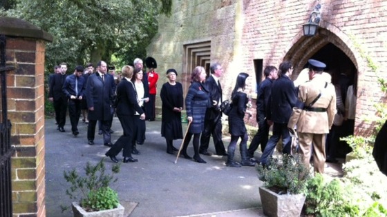 Mourners gathering at the funeral of Guardsman Michael Roland in Tollerton, Nottinghamshire