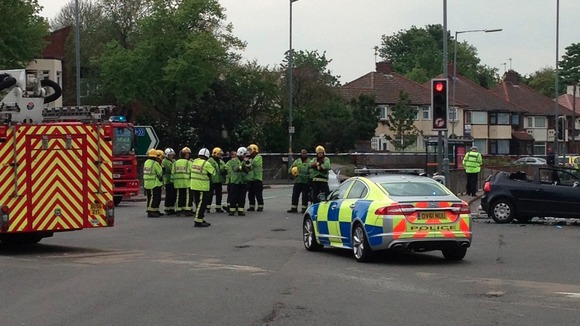 Fire crews and police at scene of A38 crash