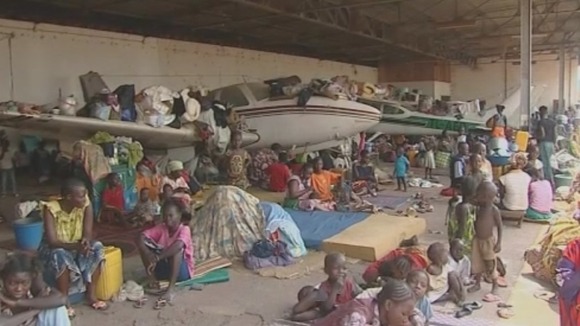 100,000 of those displaced by violence have gathered at the airport.