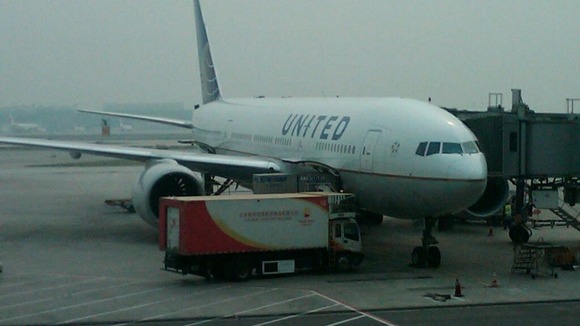 The United Airlines plane waiting at Beijing's airport which will take Chen Guangcheng to America