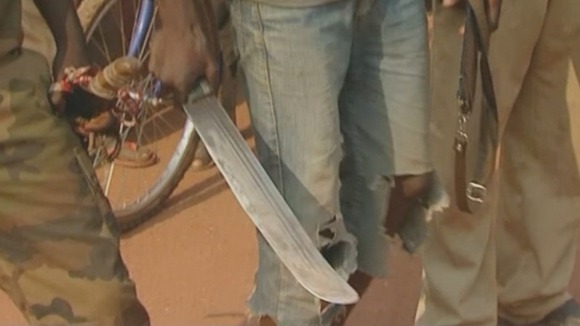 A member of the Christian militia holds a machete in CAR.