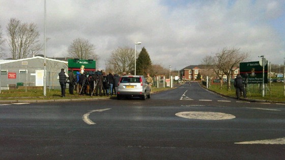 Photo of media at the entrance to 3rd Battalion