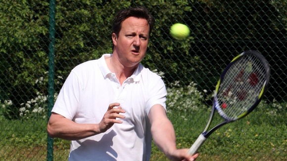 David Cameron playing tennis